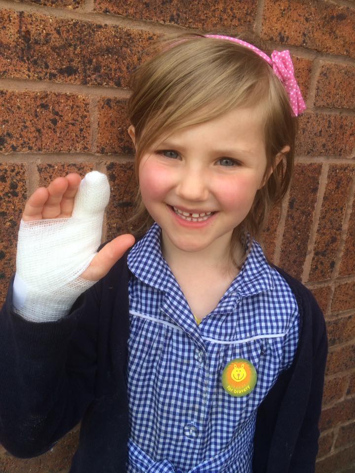 Paediatric first aid course - girl with bandage