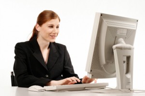 woman sitting at computer